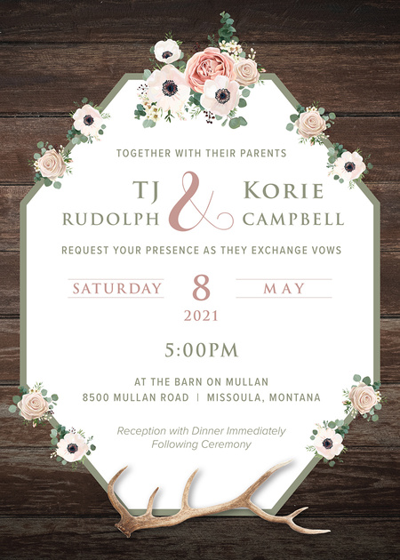 Wedding invitation with flowers, wood background, and antlers, design by Jenny Valencia Graphic Design